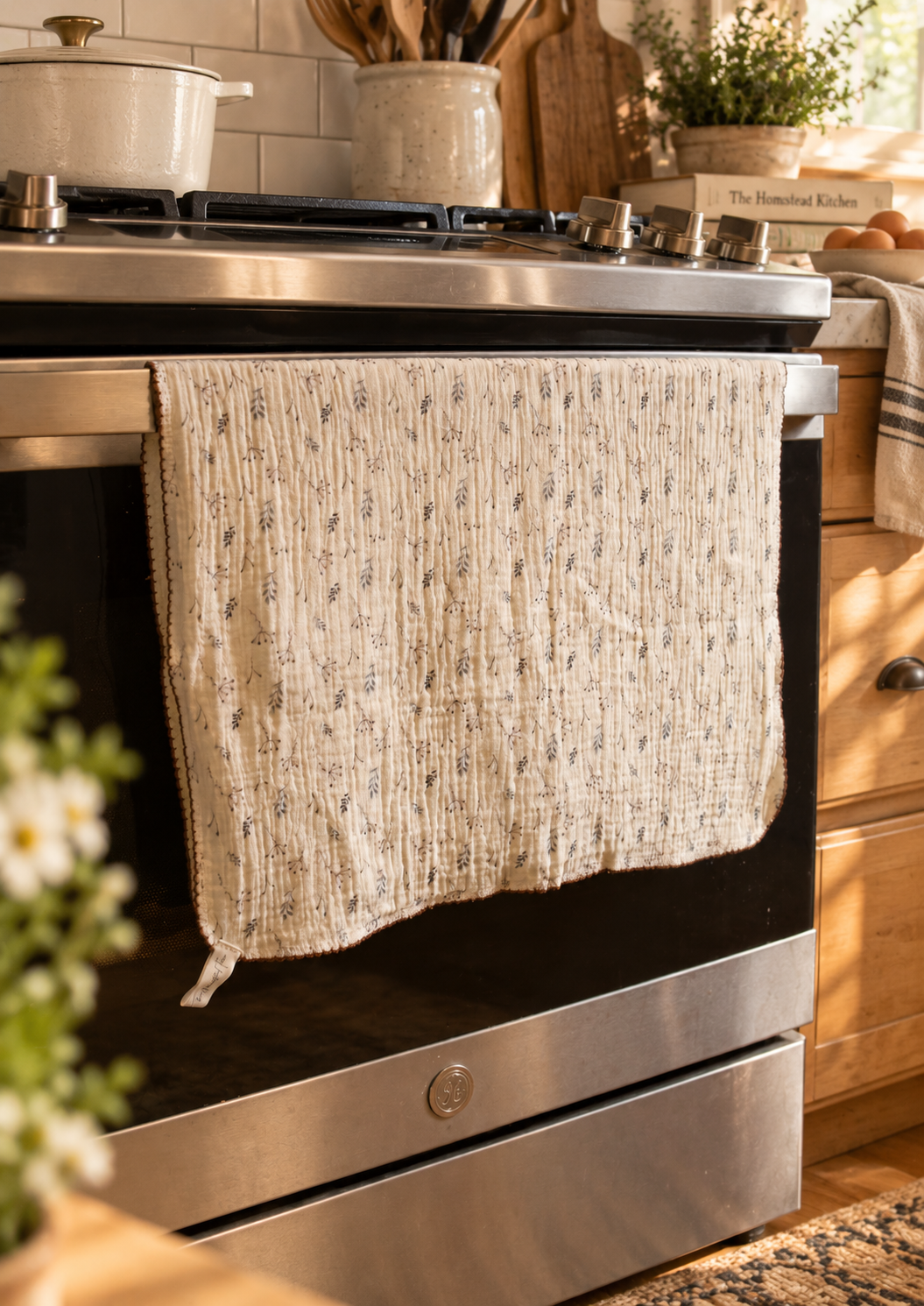 Large kitchen towels folded in a kitchen setting